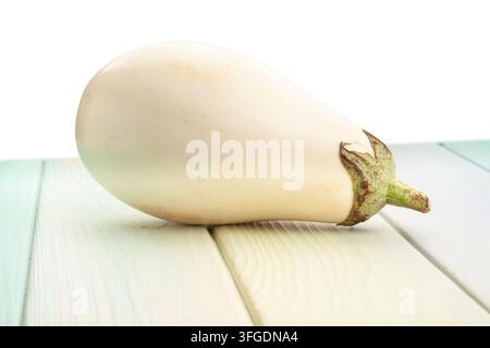 white eggplant on wood background on white Stock Photo