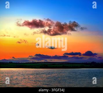 Sunset over Llyn Alaw, Anglesey. Stock Photo