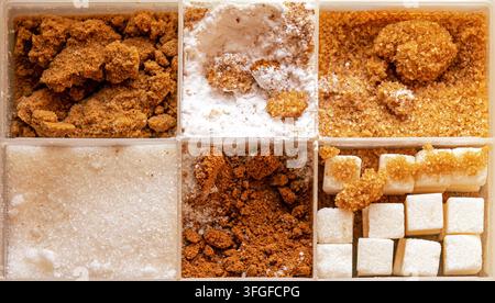 White and brown crystal sugar cane variations pattern background in plastic box Stock Photo