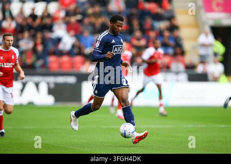 Salford City #22 Adebola Oluwo in action as he heads the ball to put ...
