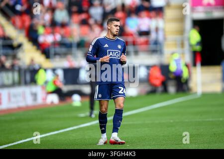 Salford City #24 Taylor Allen prepares to take a throw in during the ...