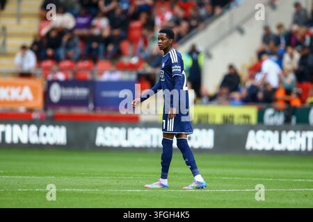 Salford City #21 Kallum Cesay celebrates the goal in front of the ...