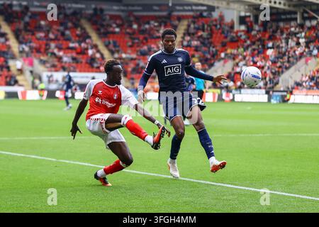 Salford City #22 Adebola Oluwo in action as he heads the ball to put ...