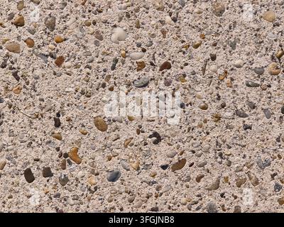 Exposed aggregate concrete texture background with small pebbles Stock Photo