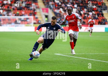 Salford City #9 Macaulay Langstaff (centre) is congratulated for ...