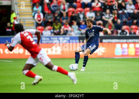 Salford City #4 Will Aimson in attacking action holds off Walsall FC #7 ...