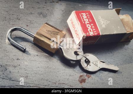 Vintage solid brass padlock with keys, USA Stock Photo