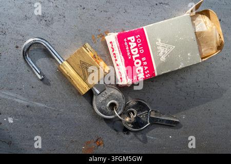 Vintage solid brass padlock with keys, USA Stock Photo