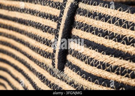 Interior design and home decor, woven jute and cotton rug texture with black and beige striped pattern for modern minimalist living space background Stock Photo