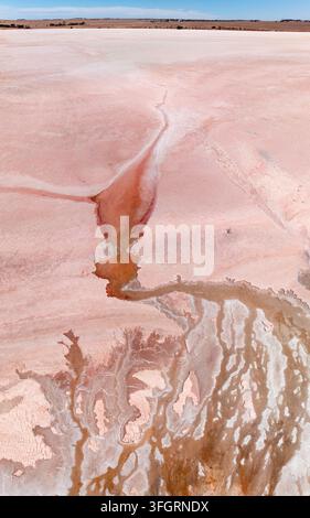 Aerial view of abstract patterns and textures in a colorful salt lake at Port Vincent on the Yorke Peninsula in South Australia. Stock Photo
