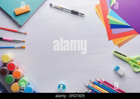 Colorful school supplies on white table. Education concept Stock Photo