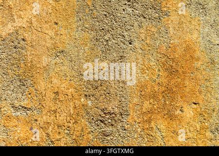 Cement texture of exterior wall. Yellow wall surface Stock Photo