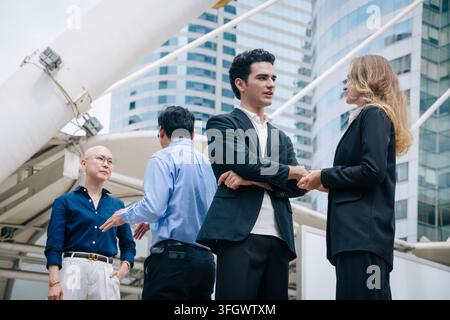 Business People Meeting Contact in an Urban Connections and Collaborations in a Modern City Outdoors Office background. Stock Photo