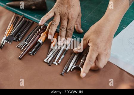 Close Up Artisan Hand Tools Work Leathercraft Workshop Handmade Master Artist Desk Top View, Craftsman Handmade Custom Goods Studio Creation Skill Sma Stock Photo
