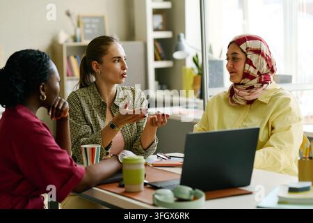 Diverse Businesswomen Collaborating in Office Team Meeting Stock Photo