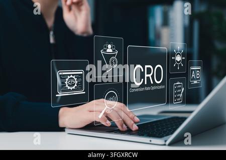 CRO conversion rate optimization concept. Person using laptop, CRO analytics, A B testing, customer funnel, website performance, audience targeting, Stock Photo