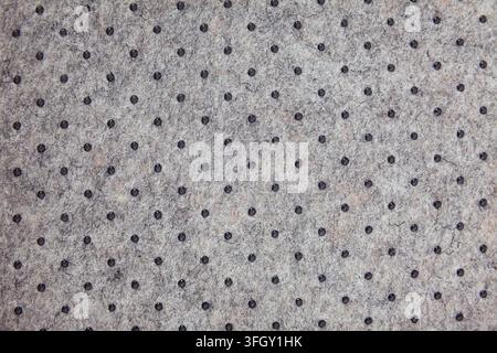 Surface of felted polyester fabric texture with plastic dots Stock Photo