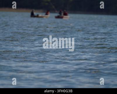 Close-up of a Blue Water Surface with Gentle Ripples Stock Photo