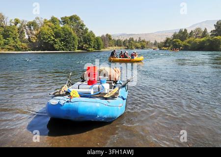 Boatloads of white water rafters prepare to launch their rafts on the Deschutes River at the Trout Creek launch area and campground near Gateway, Oreg Stock Photo