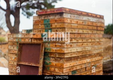 Stack of Weathered Wooden Construction Materials Outdoors Stock Photo
