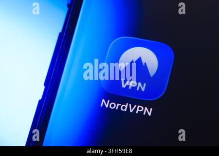 Paris, France - September 15, 2026: NordVPN application icon displayed on a smartphone screen with blue lighting. Stock Photo