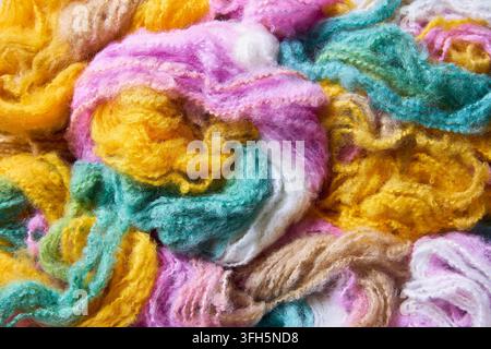 Close up of tangled colorful fuzzy wool yarn Stock Photo