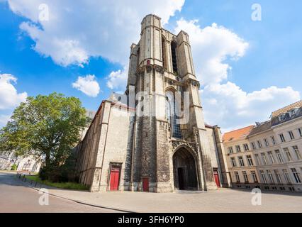 The historic Saint Michael Church or Sint Michielskerk building with unfinished gothic tower in Ghent, Belgium Stock Photo