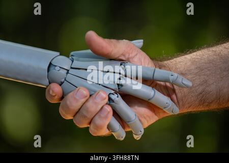 Robot hands with human intelligence. Human hands in robotic ai. Robot hands on digital innovation. Human hands with robot future. Stock Photo