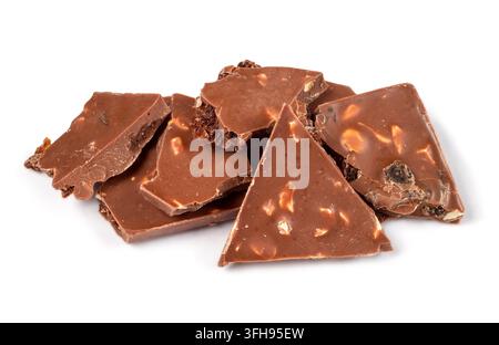 Pieces of chocolate with raisins and nuts. Chocolate on a white background. Stock Photo