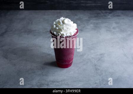 A view of a blueberry smoothie. Stock Photo