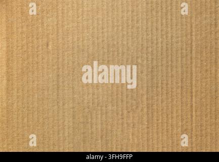 Macro background texture of clean brown corrugated cardboard paper sheet for packaging and eco friendly craft design Stock Photo