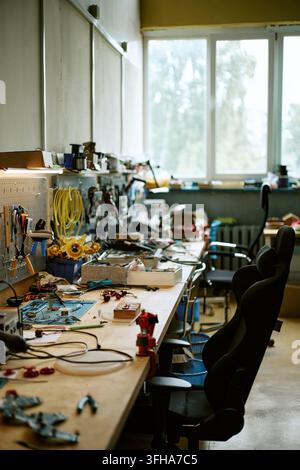 Electronics Engineering Workshop with Tools on Workbench Stock Photo
