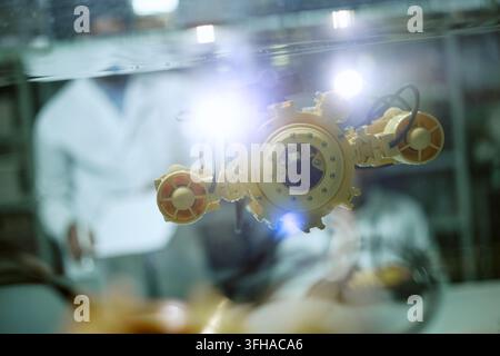 Scientists Testing Robotic Underwater Drone in Laboratory Tank Stock Photo