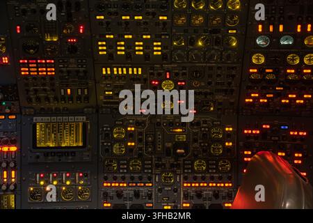 Detailed close-up of the illuminated flight engineer control panel inside the Concorde cockpit on display at the Aerospace Bristol museum, UK Stock Photo