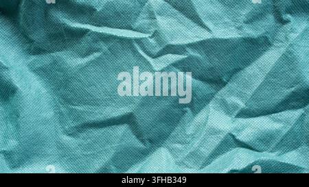 Crumpled Teal Green Non Woven Fabric Texture Abstract Background Stock Photo