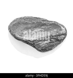 Smooth oblong grey river stone isolated on white background. Natural pebble with horizontal striations and soft shadow. Organic element Stock Photo