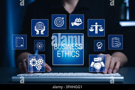 Business ethics and corporate responsibility concept. Businessman using computer and compliance, accountability, transparency, fairness, governance, t Stock Photo