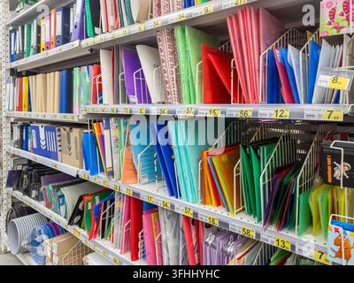 Kyiv, Ukraine - March 13, 2026: Rows of diverse plastic folders and paper binders sit neatly on retail store shelves to assist with efficient document Stock Photo