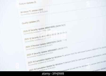 Poznan, Poland - February 15, 2026: Digital computer display showing a list of Microsoft Windows software updates and patches to maintain system secur Stock Photo