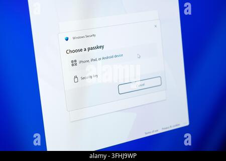 Poznan, Poland - February 15, 2026: Digital authentication interface displaying a passkey selection window for system verification during a private us Stock Photo