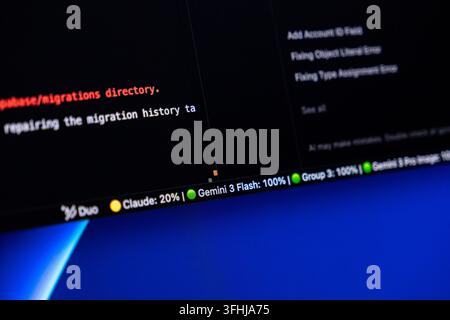 Poznan, Poland - February 9, 2026: Code editor window displaying status updates for migration tasks, representing modern engineering practices and clo Stock Photo