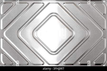 Silver metal surface featuring geometric embossed pattern Stock Photo