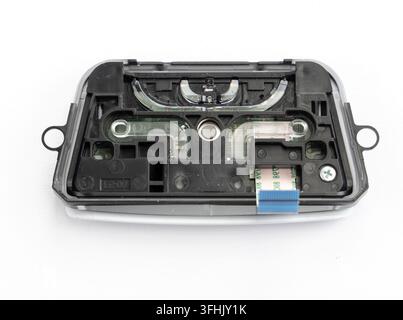 An electronic module with exposed circuit board on a clean white surface Stock Photo