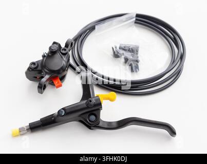 New bicycle hydraulic disc brake components are isolated on a white background Stock Photo