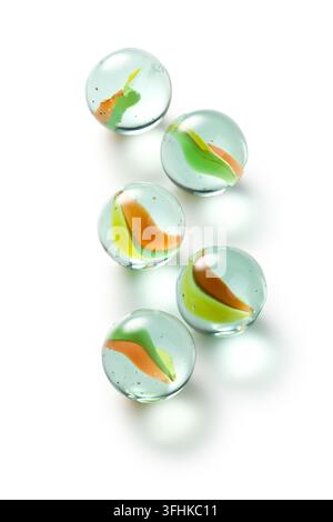 colorful glass marbles on white background Stock Photo