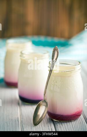 Fruity yogurt in jar Stock Photo