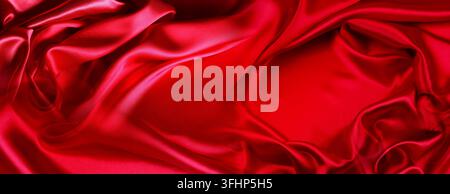 Ripples in red silk fabric Stock Photo