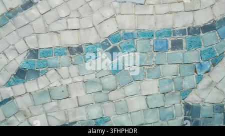 Macro of blue white and turquoise glass mosaic with wavy pattern Stock Photo