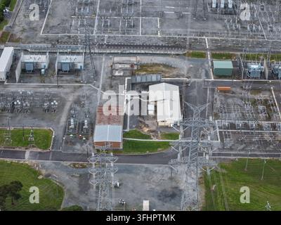 Ringwood, Victoria, Australia - 13 September 2026: Aerial view of Ringwood Terminal Station with electrical transformers, power lines, and steel trans Stock Photo