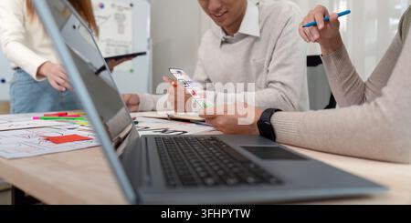 Brainstorm team of creative web graphic designer planning, Group of mobile phone app developer team meeting for share ideas about screen prototype lay Stock Photo